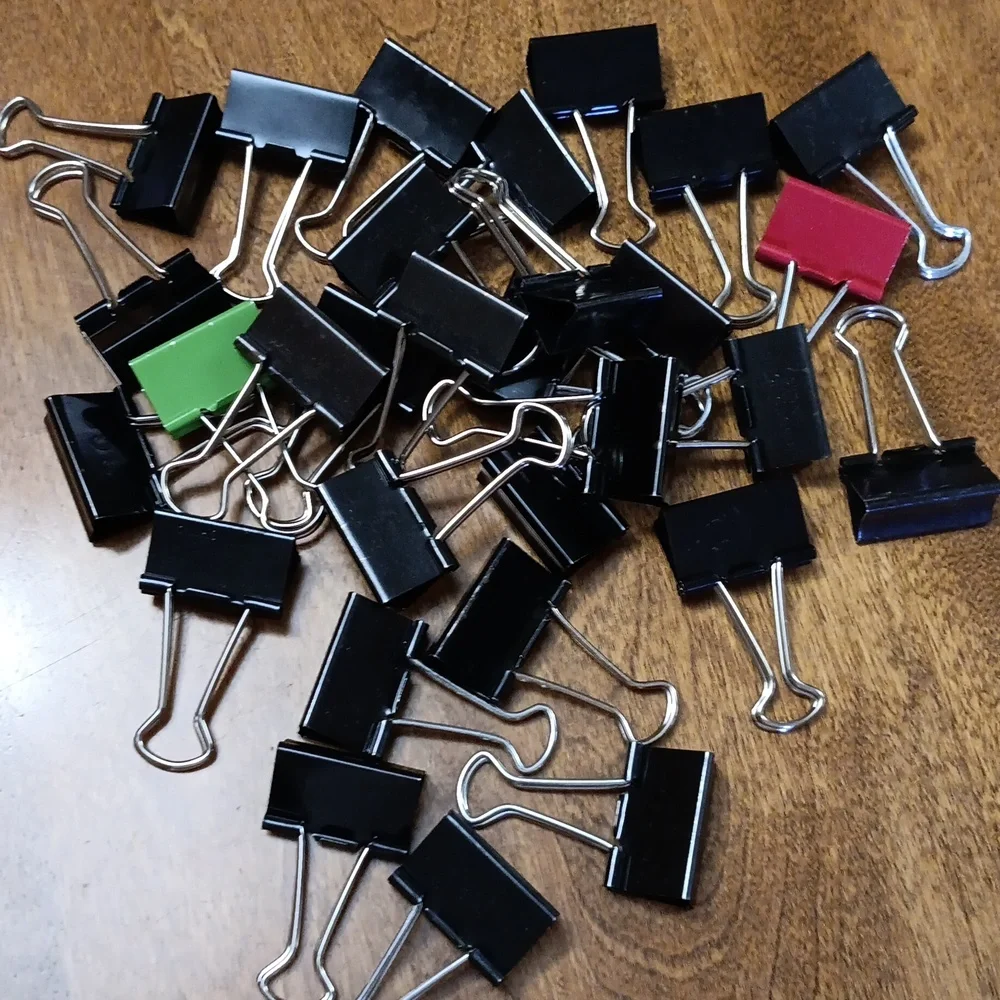 Assorted size binder paper Clips
